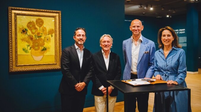 from left to right Ronald Leunisse, Managing Director DHL Express Netherlands, Willem van Gogh, Advisor to the Board of the Van Gogh Museum, Alberto Nobis, CEO of DHL Express Europe and Emilie Gordenker, General Director of the Van Gogh Museum in front of Sunflowers (1889). Credit: Jelle Draper
